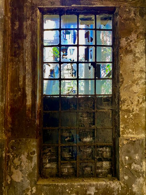 Free Rustic window in an abandoned building, showcasing decaying beauty in Völklingen, Germany. Stock Photo