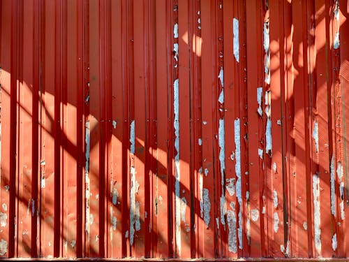 Red Wall with Peeling Paint