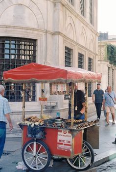 People Standing Near Food Stall