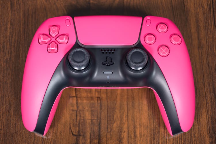 Close-Up Shot Of A Pink Game Controller