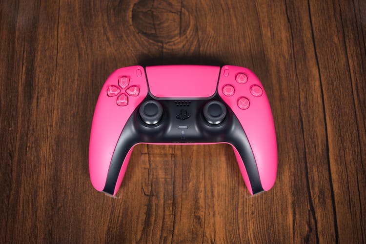 Close-Up Shot Of A Pink Game Controller