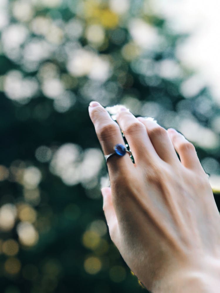 Close-Up Shot Of A Person's Hand With A Ring