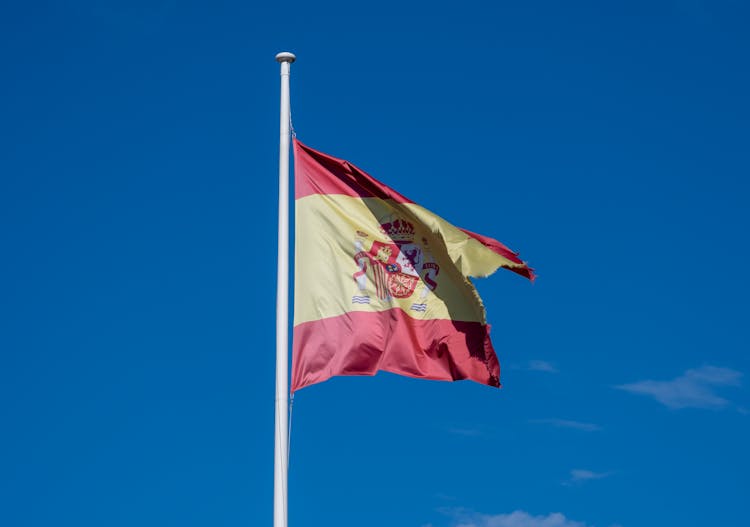 Spanish Flag On A Pole.