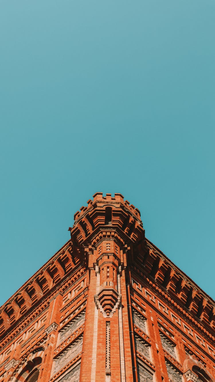 Brick Old Building On Blue Sky