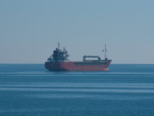A Cargo Ship Sailing on the Sea