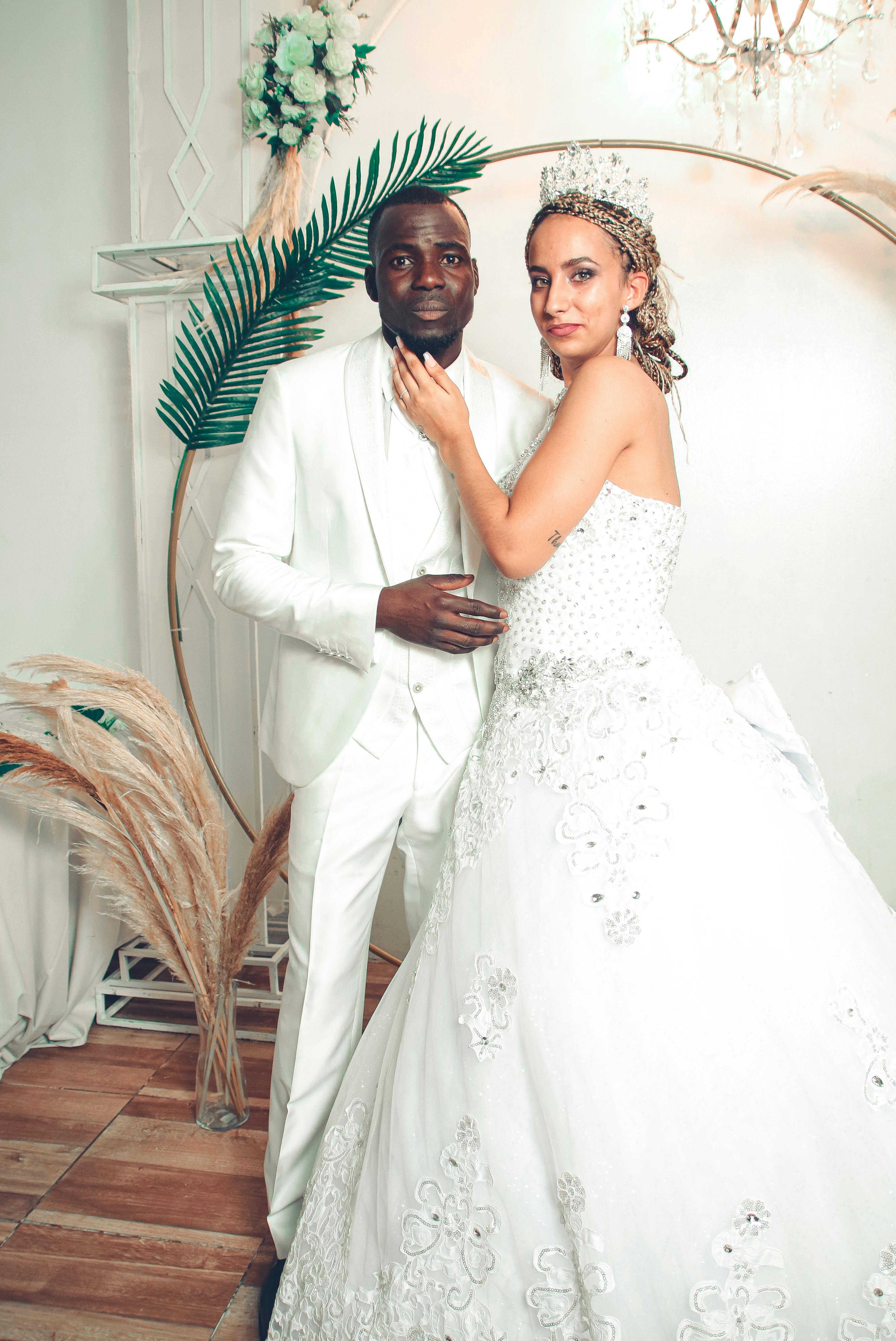 Man in White Suit and Woman in White Wedding Gown · Free Stock Photo