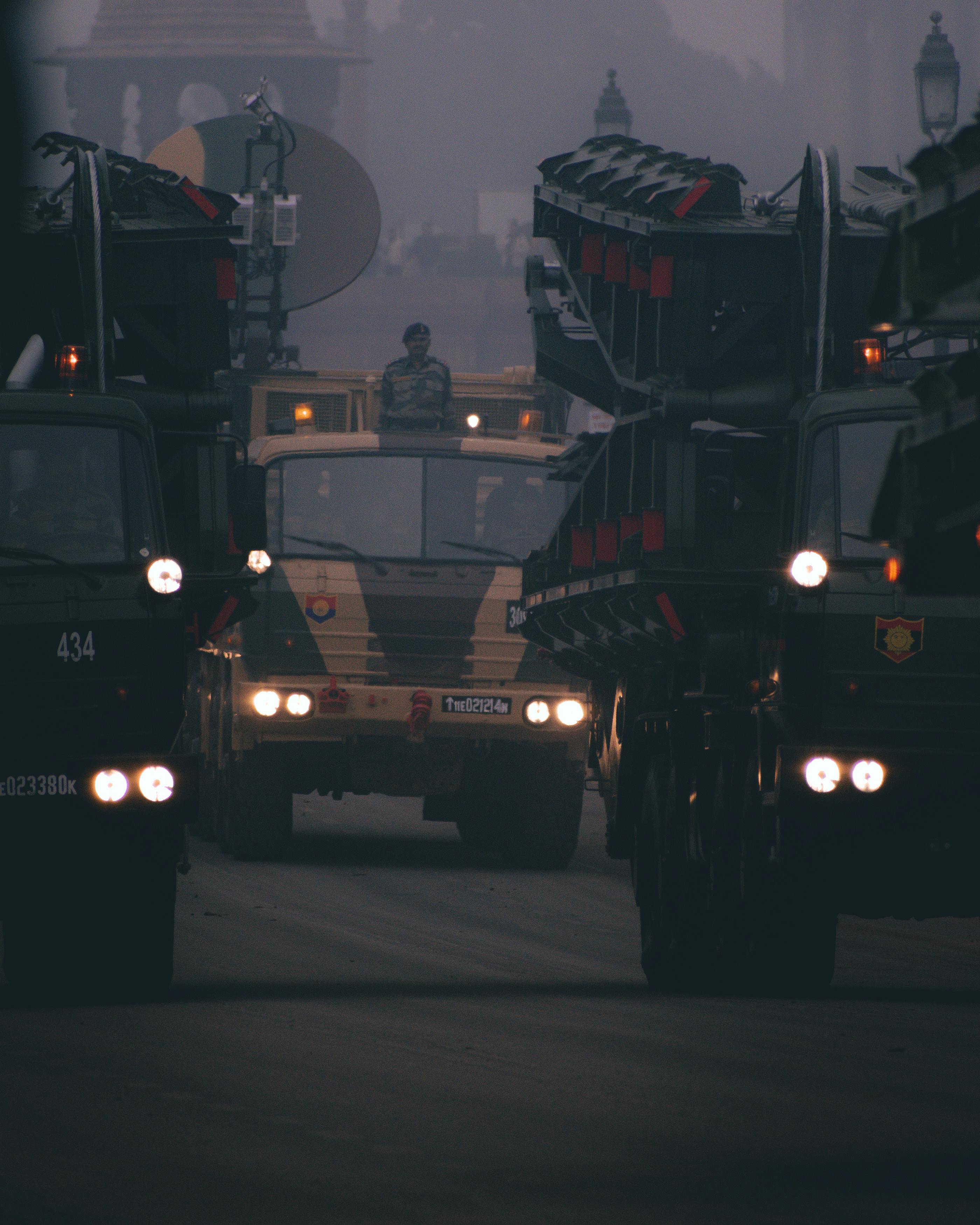 army trucks on road