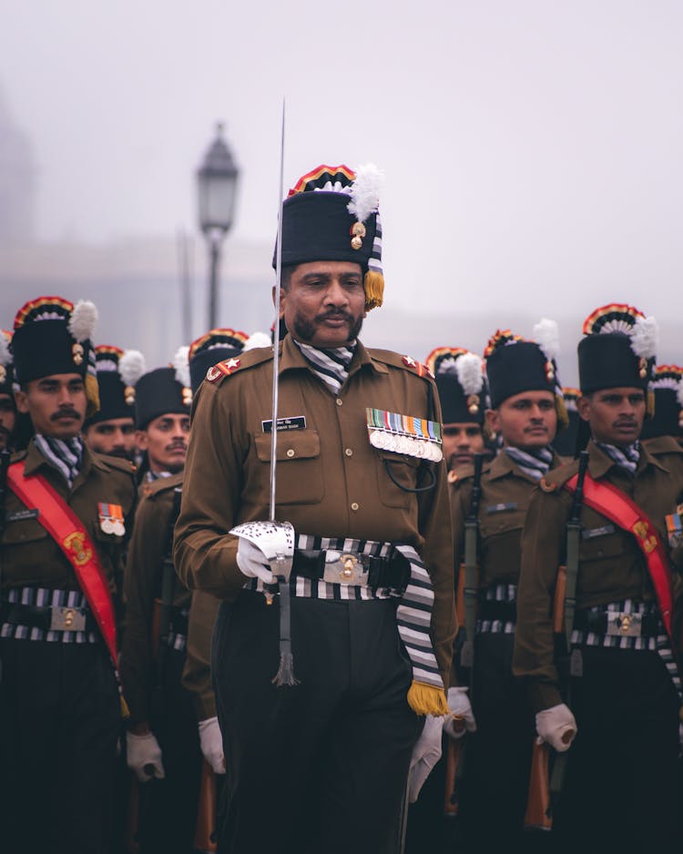 A Man Holding A Sword