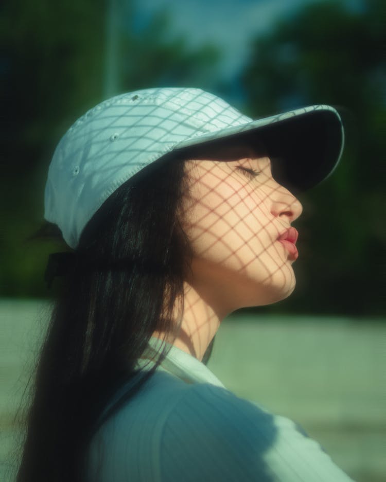 Pretty Brunette Woman With Shadow On Face