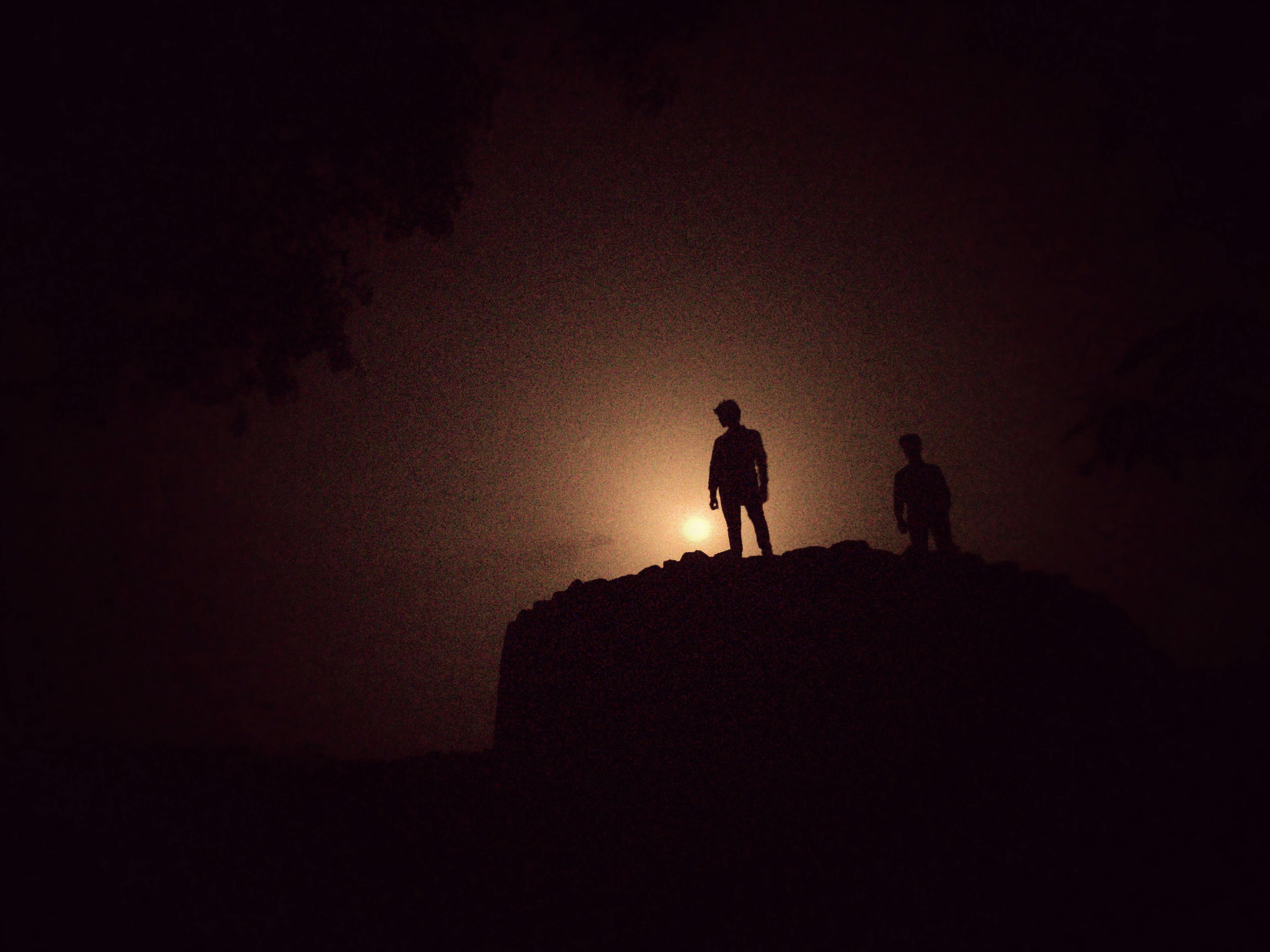Free stock photo of full moon, men, On top of the night