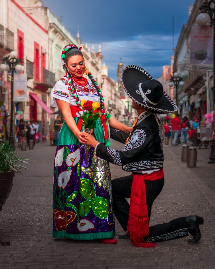 A Happy Couple Wearing Traditional Mexican Clothes Celebrating Cinco De Mayo