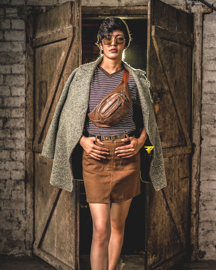 Person Wearing Pencil Skirt Standing In Barn Entrance Doors