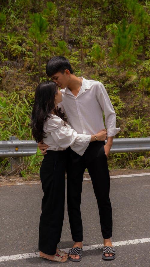 Free Photo of a Couple in White Tops Stock Photo