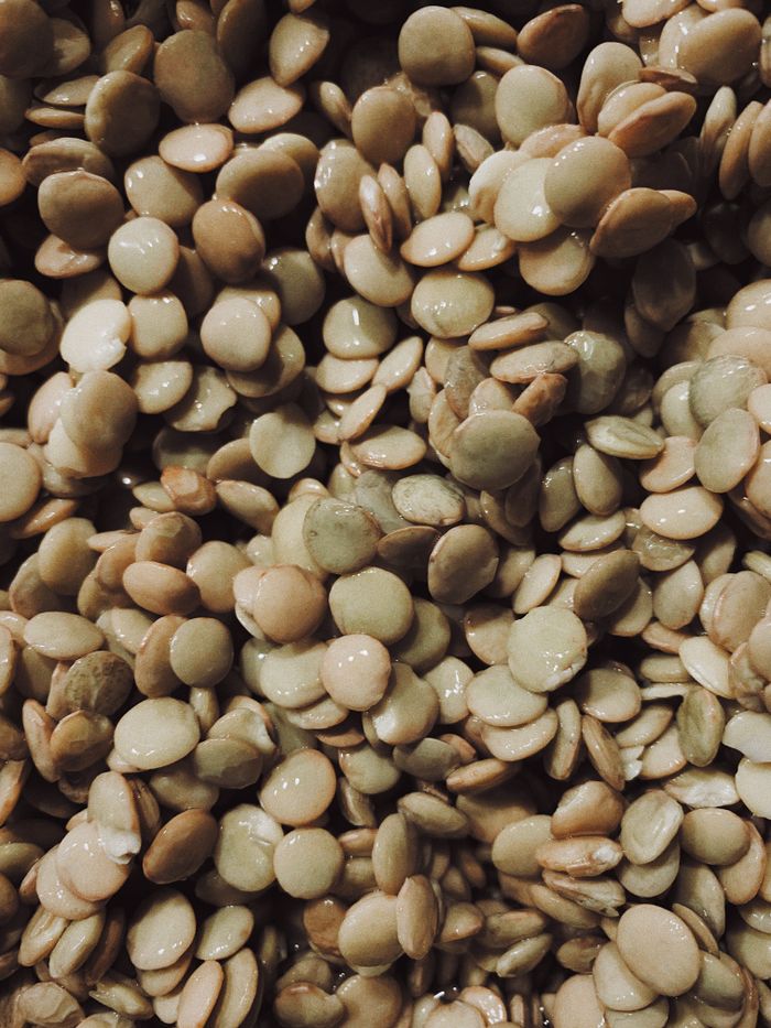 Close-up of raw brown lentils, photo by Tamara Elnova on Pexels