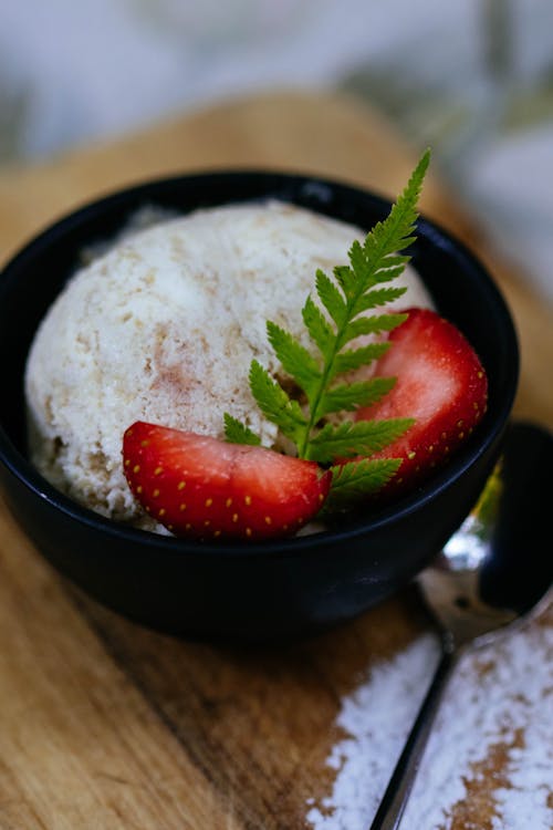 Slice Of Strawberry On Icecream In Bowl