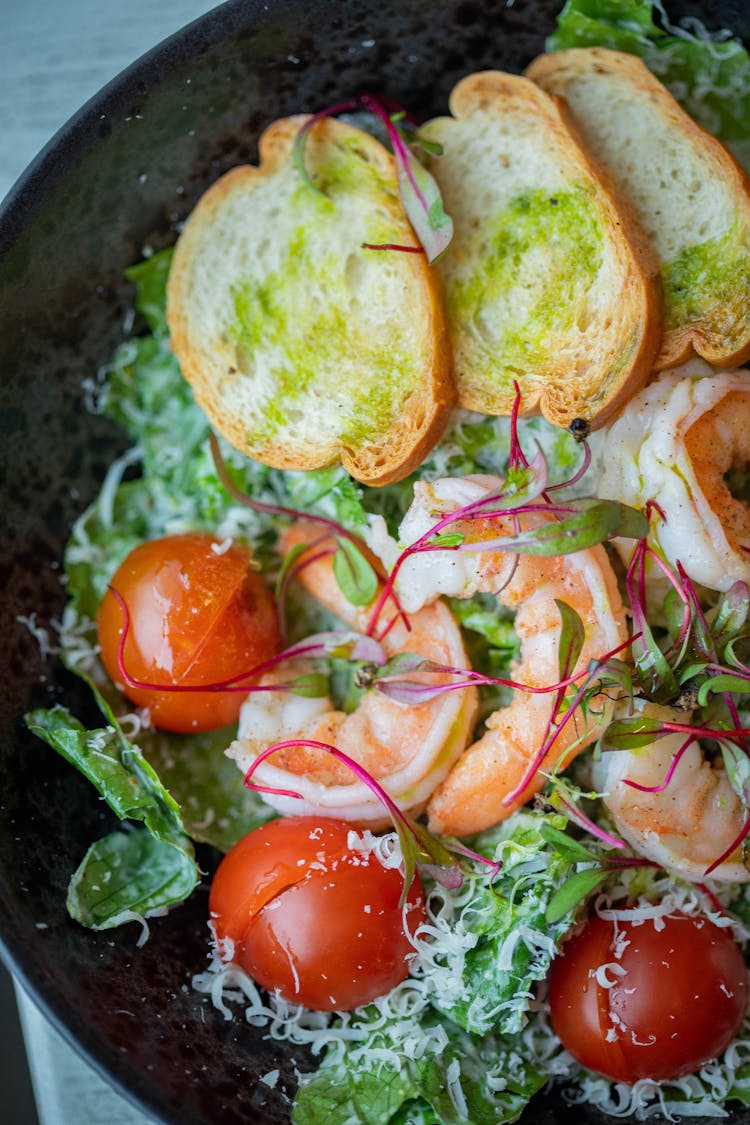 Bread, Tomatoes And Seafood On Pan