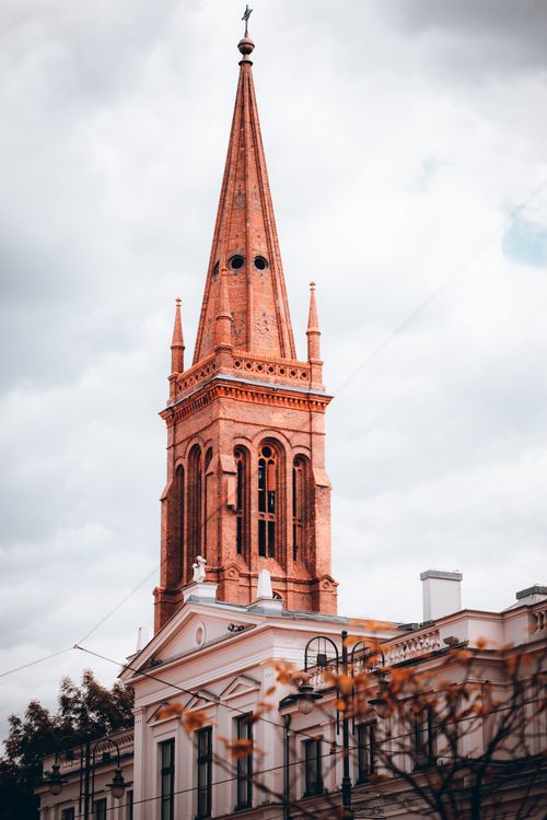Free A beautiful gothic church spire in Bydgoszcz, showcasing architectural elegance. Stock Photo