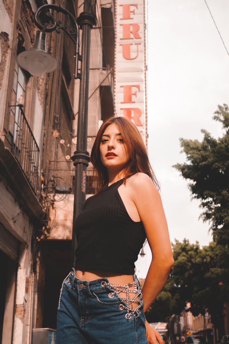 Woman Standing On A Street 