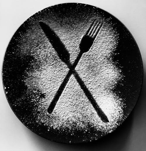 Contour of Fork and Knife on Powder