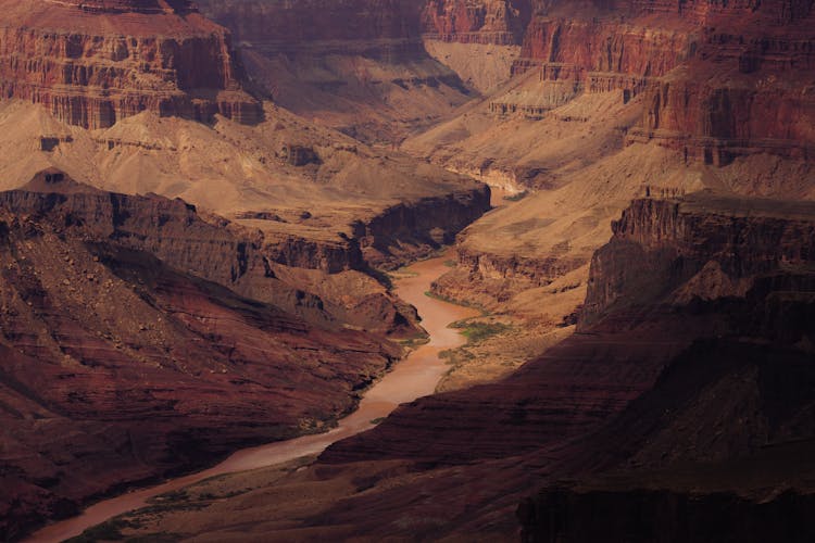 River Between Brown Mountains