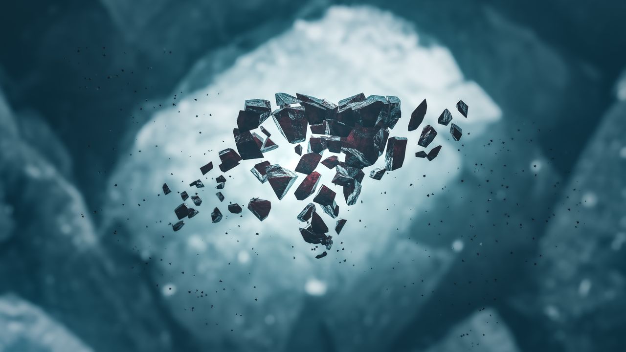 exploding heart shaped fragments in an icy abstract setting
