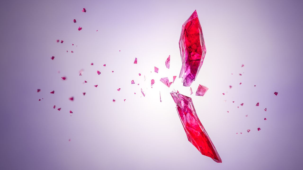 dynamic 3d rendering of a shattered red crystal with vibrant fragments