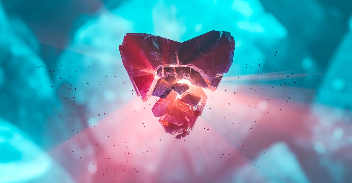 Abstract image of a shattered heart-shaped crystal glowing with vibrant light and particles.