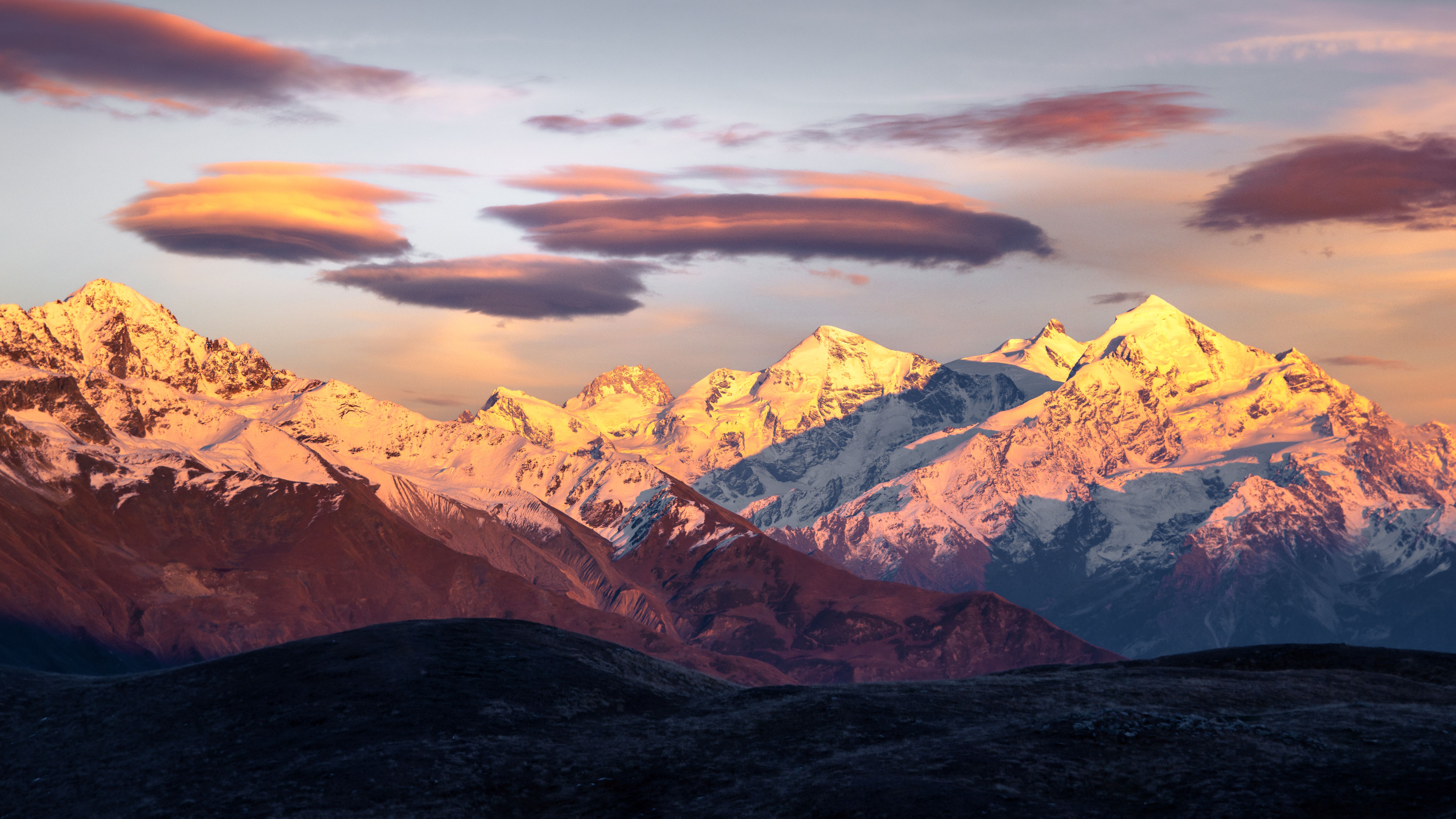 Clouds above Snow Capped Mountains · Free Stock Photo