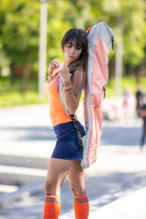 Woman in Sportswear with Sport Equipment Outdoors