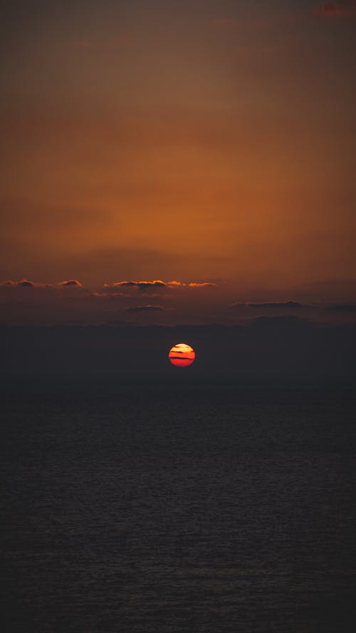 Foto profissional grátis de água, alvorecer, cair da noite