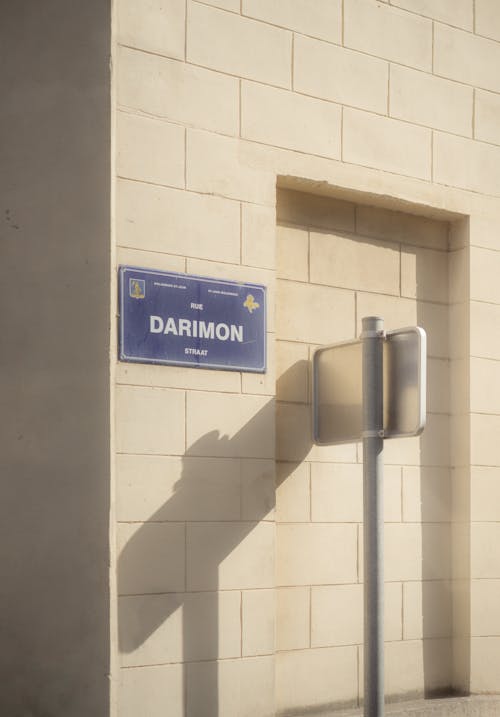 Building Exterior with a Street Name Plate 