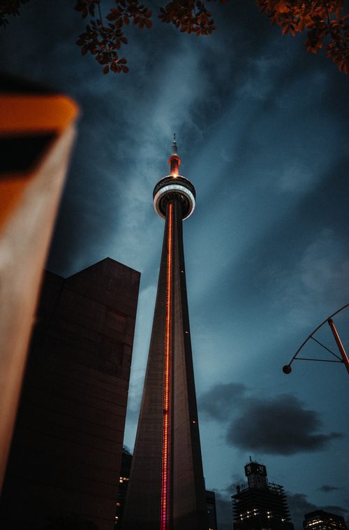 Free Spectacular view of the illuminated CN Tower rising into the night sky in downtown Toronto. Stock Photo