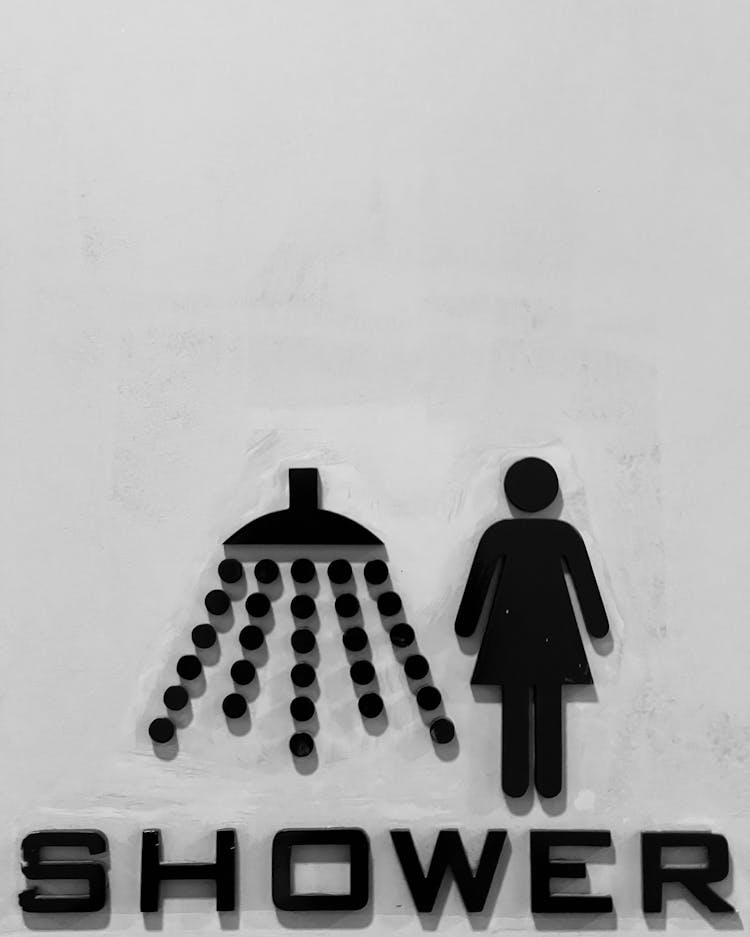 Black And White Photo Of A Shower Sign