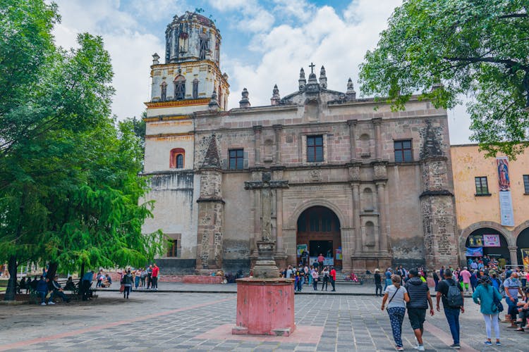 People Standing Near Parroquia San Juan Bautista 