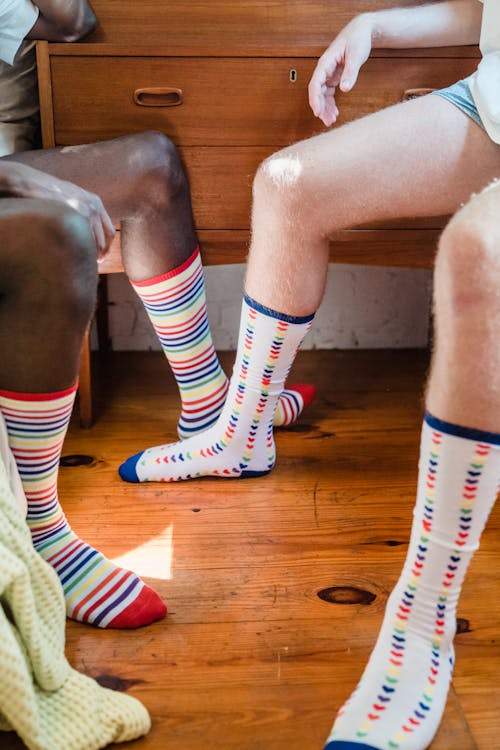 Close-up of Men Wearing High Colorful Socks 