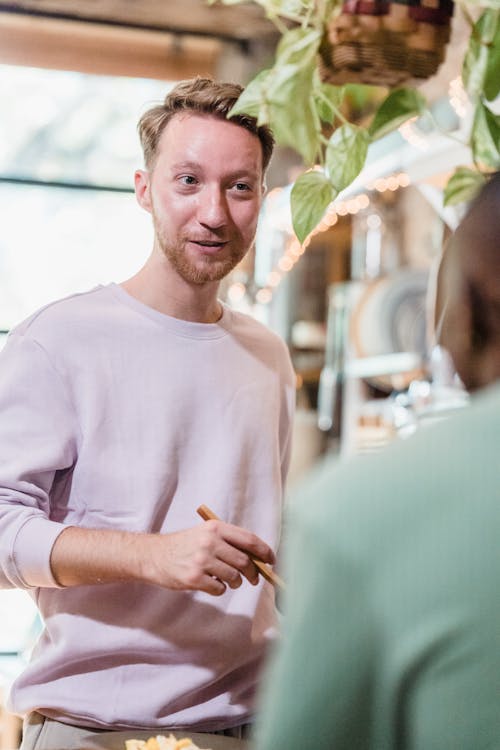 Men Talking in a Kitchen 