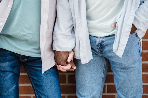 Close-up of a Couple Holding Hands