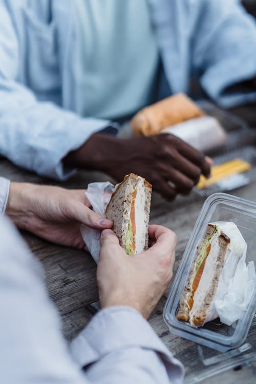 Man Holding a Sandwich 