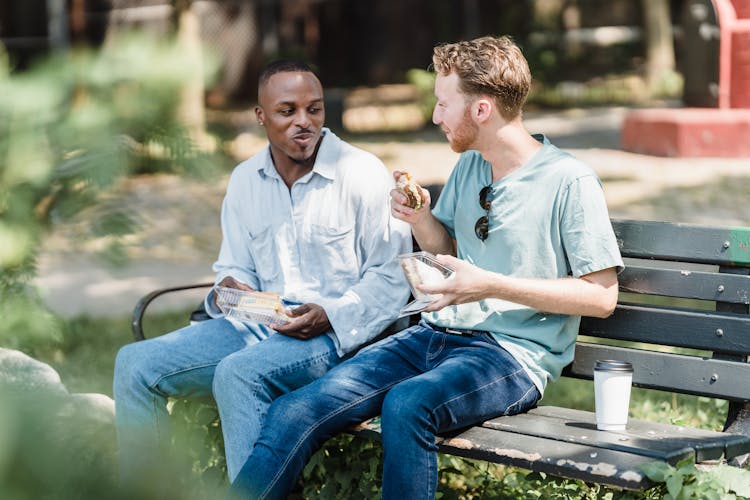 Couple Eating Lunch In Park