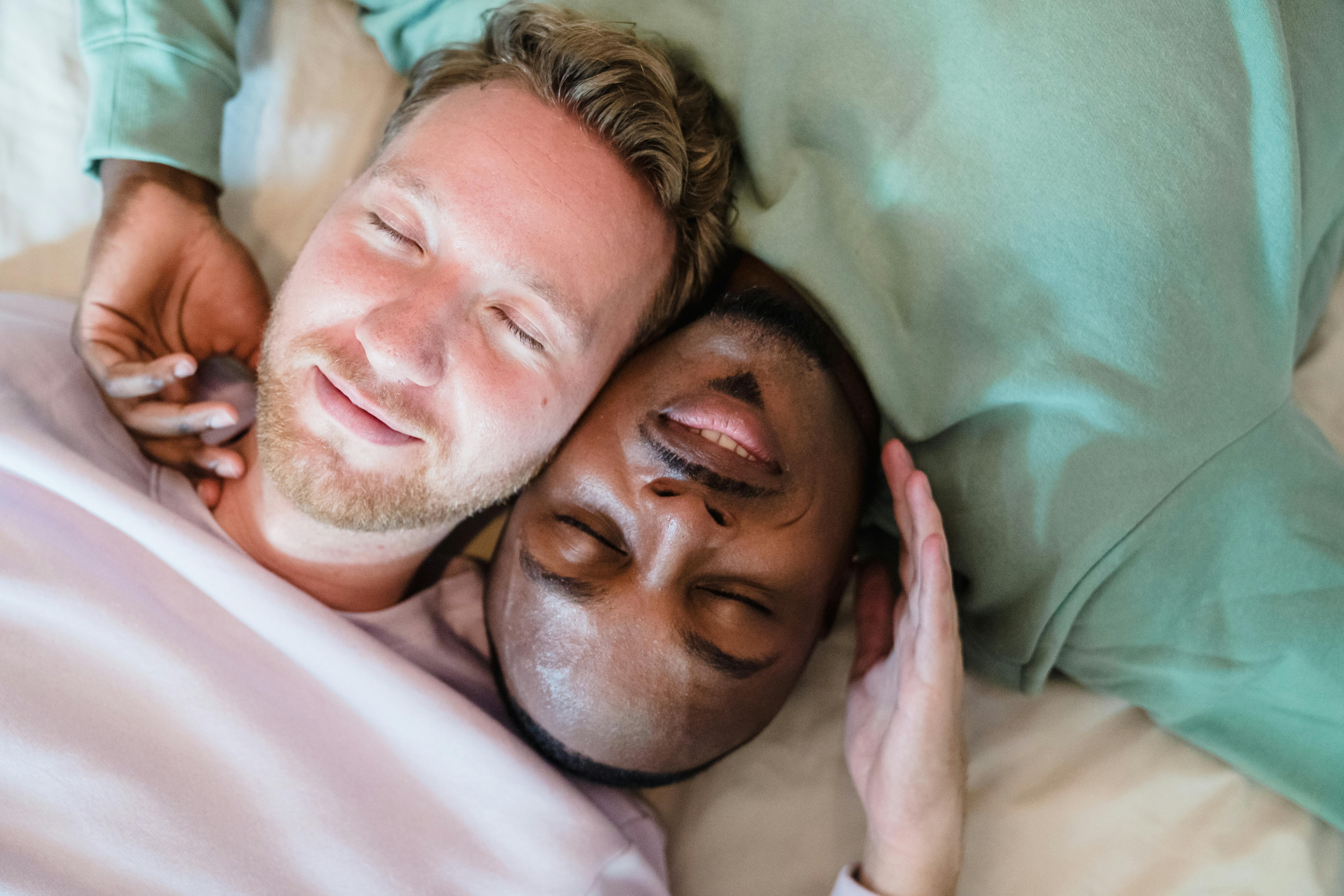 faces of men hugging