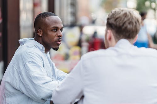 Men in Shirts Sitting