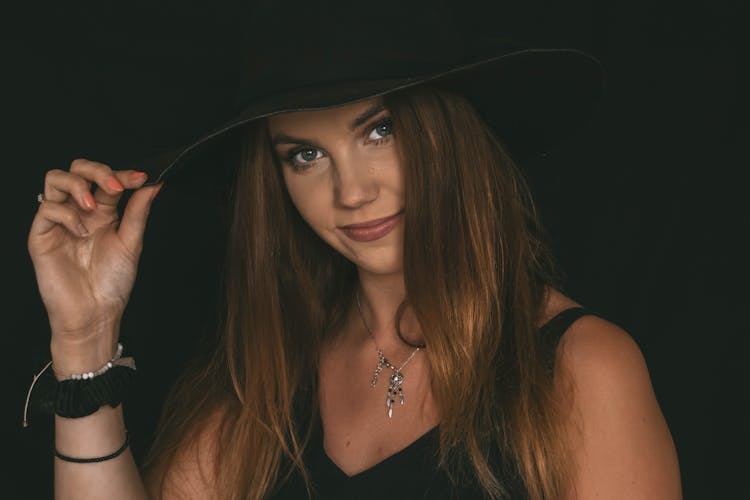 Close Up Photo Of Woman Wearing A Hat