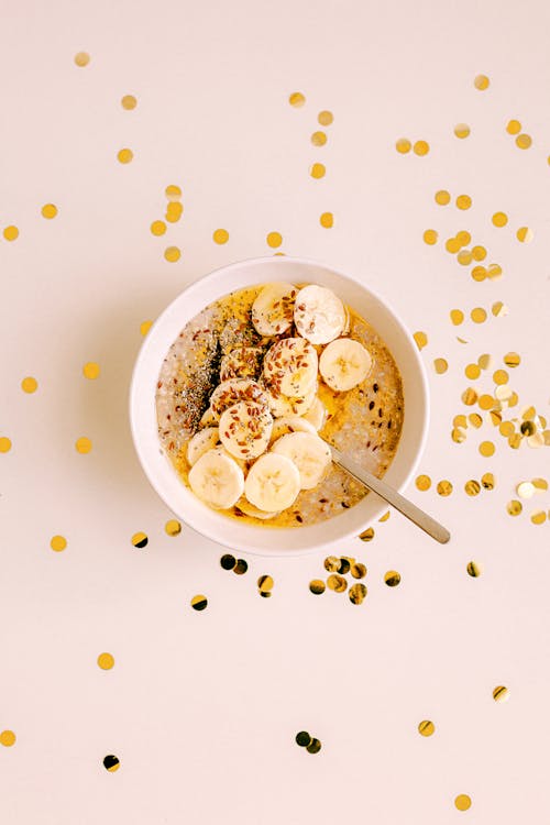 Free Bowl of Sliced Bananas With Rice Crispies Stock Photo