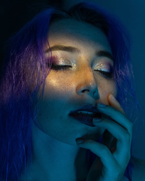 Close-up of a Beautiful Woman with Purple Hair