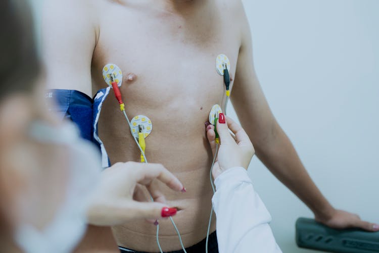 Close Up Of Doctor Examining Patient