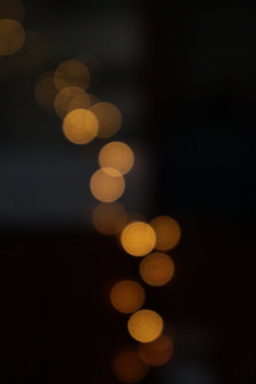 Foto profissional grátis de bokeh, confuso, luzes amarelas