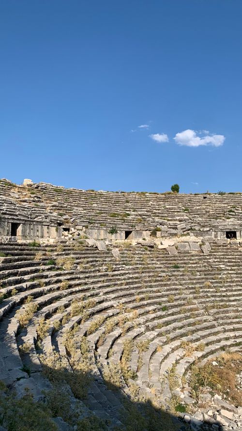 Free Explore the historic ruins of the ancient amphitheater in Burdur, Turkey, under a clear blue sky. Stock Photo