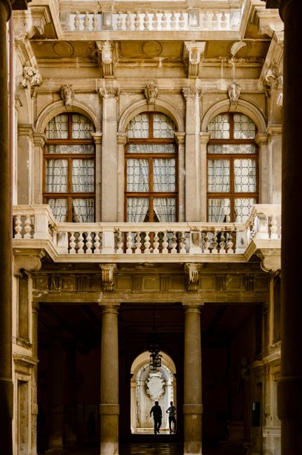 Stunning vertical shot of Ca' Rezzonico facade showcasing Venice's classic Baroque architecture.