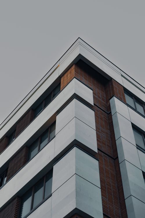 Free Low-angle view of a geometrically designed residential building facade in Mashhad, Iran. Stock Photo