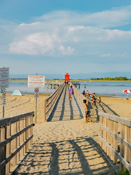 People walking on a Jetty 